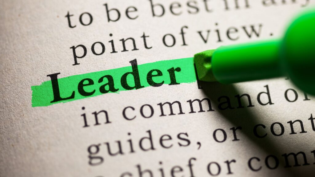 the word leader highlighted in green in a dictionary
