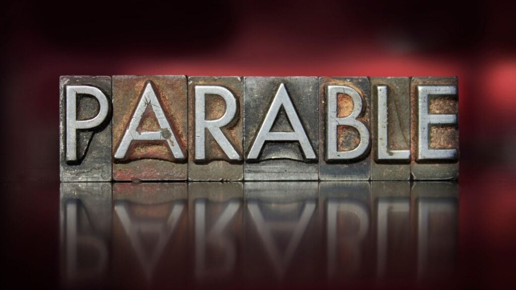 the word parable spelled out in tiles on a dark background